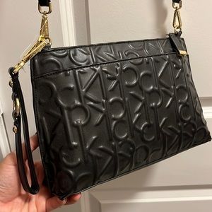 Brand new faux leather Calvin Klein 3-in-1 purse.